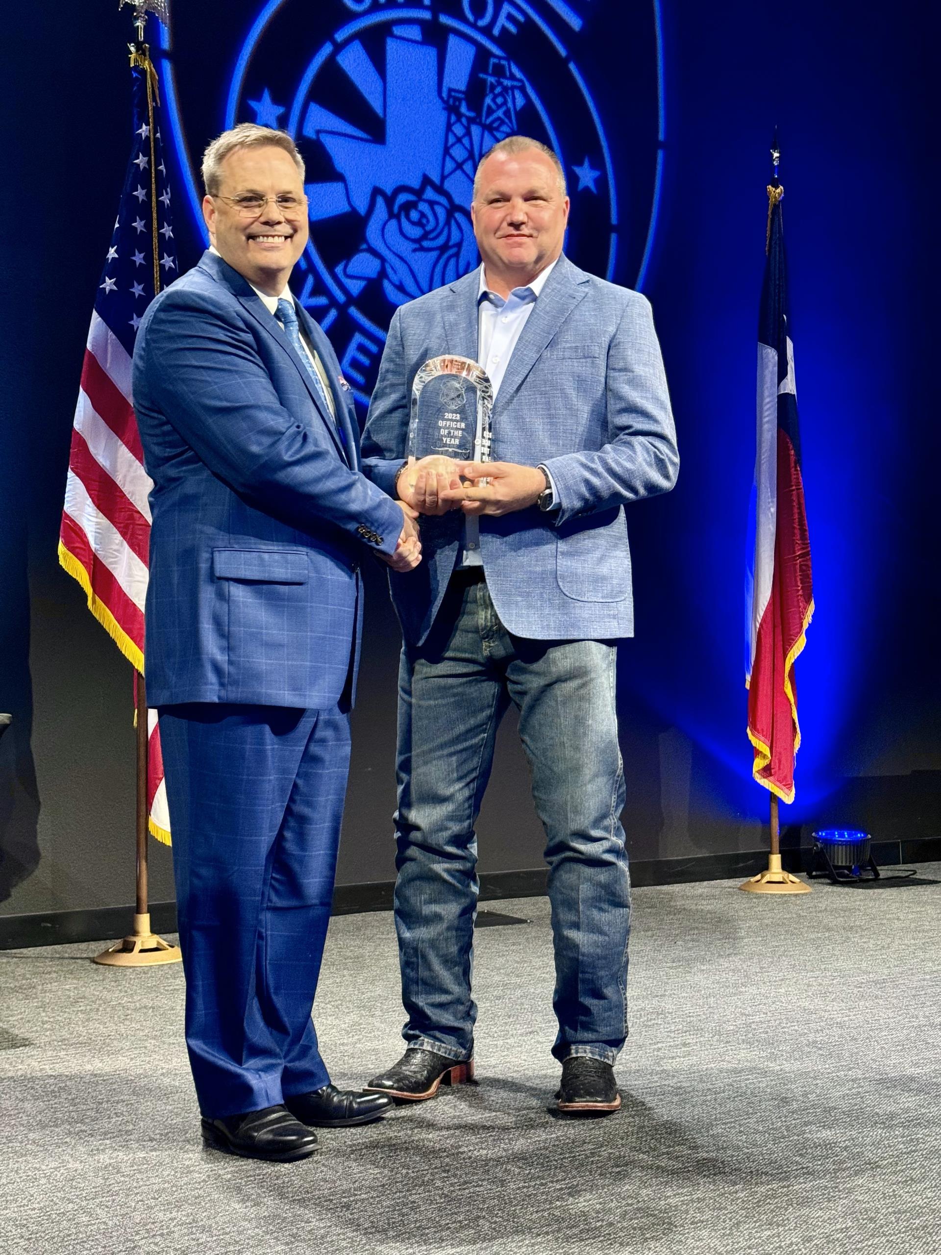 2024 Officer of the Year Steve Black with Police Chief Jimmy Toler