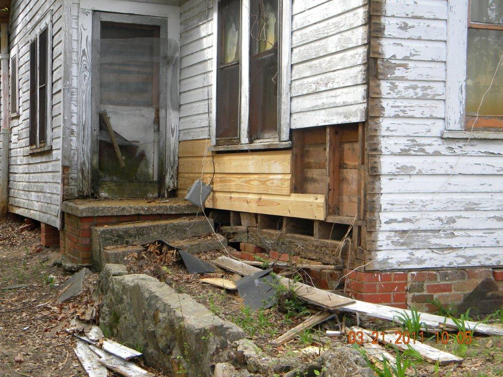 House with collapsed deck