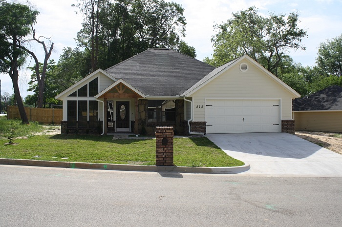 Curb view of recently built house